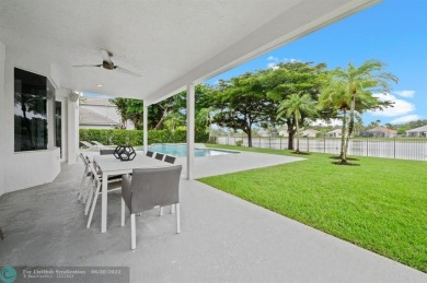 WELCOME TO THIS STUNNING COMPLETELY REMODELED 2 STORY RESIDENCE on Weston Hills Country Club in Florida - for sale on GolfHomes.com, golf home, golf lot