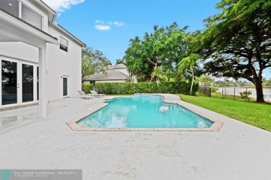 WELCOME TO THIS STUNNING COMPLETELY REMODELED 2 STORY RESIDENCE on Weston Hills Country Club in Florida - for sale on GolfHomes.com, golf home, golf lot