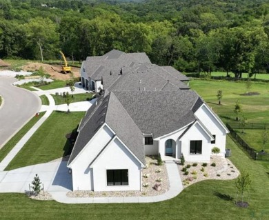 Brand new reverse plan by award winning Homes by Chris. This on Staley Farms Golf Club in Missouri - for sale on GolfHomes.com, golf home, golf lot