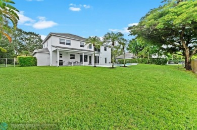 WELCOME TO THIS STUNNING COMPLETELY REMODELED 2 STORY RESIDENCE on Weston Hills Country Club in Florida - for sale on GolfHomes.com, golf home, golf lot