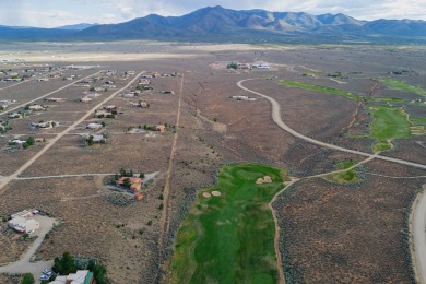 Beautiful Vista Linda building site that borders the golf course on Taos Country Club in New Mexico - for sale on GolfHomes.com, golf home, golf lot