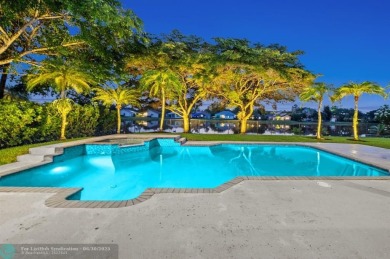 WELCOME TO THIS STUNNING COMPLETELY REMODELED 2 STORY RESIDENCE on Weston Hills Country Club in Florida - for sale on GolfHomes.com, golf home, golf lot