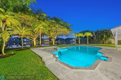 WELCOME TO THIS STUNNING COMPLETELY REMODELED 2 STORY RESIDENCE on Weston Hills Country Club in Florida - for sale on GolfHomes.com, golf home, golf lot
