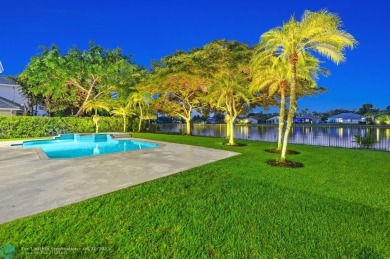 WELCOME TO THIS STUNNING COMPLETELY REMODELED 2 STORY RESIDENCE on Weston Hills Country Club in Florida - for sale on GolfHomes.com, golf home, golf lot