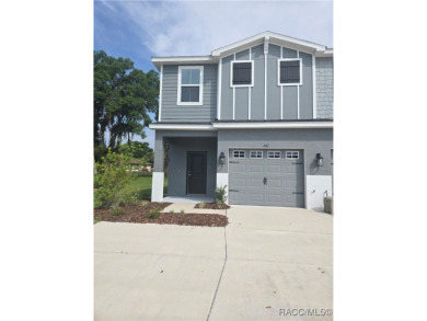 THE BLUE HERON TOWNHOUSE - Located in * The Premier Lakeside on Inverness Golf and Country Club in Florida - for sale on GolfHomes.com, golf home, golf lot