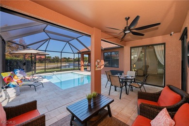 Welcome to this beautifully updated 4-bedroom, 3-bath pool home on Gateway Golf and Country Club in Florida - for sale on GolfHomes.com, golf home, golf lot