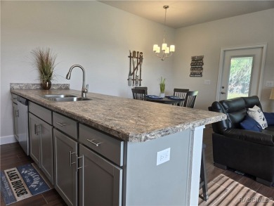 THE BLUE HERON TOWNHOUSE - Located in * The Premier Lakeside on Inverness Golf and Country Club in Florida - for sale on GolfHomes.com, golf home, golf lot