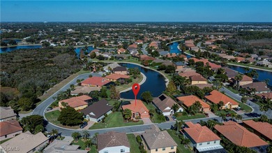 Welcome to this beautifully updated 4-bedroom, 3-bath pool home on Gateway Golf and Country Club in Florida - for sale on GolfHomes.com, golf home, golf lot