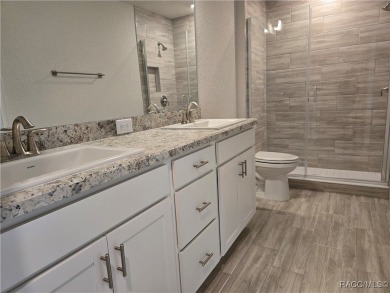 THE BLUE HERON TOWNHOUSE - Located in * The Premier Lakeside on Inverness Golf and Country Club in Florida - for sale on GolfHomes.com, golf home, golf lot