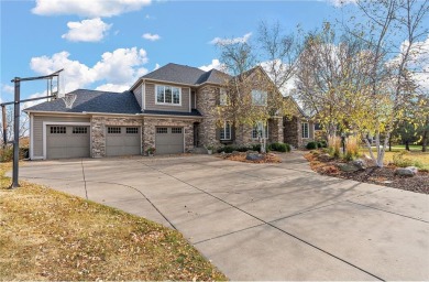 This jaw dropping house on an .5 acre lot overlooking Prestwick on Prestwick Golf Club At Wedgewood in Minnesota - for sale on GolfHomes.com, golf home, golf lot