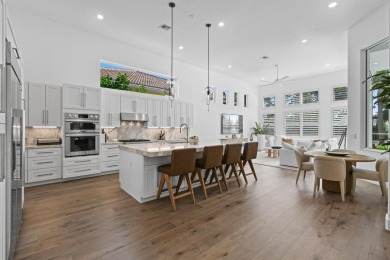This expanded Montecito model has been completely reimagined on Frenchmans Reserve in Florida - for sale on GolfHomes.com, golf home, golf lot