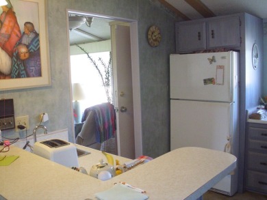 This 1976 Double wide Manufactured home with added 20x 11 on The Club At Shenandoah Springs in California - for sale on GolfHomes.com, golf home, golf lot