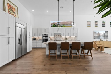 This expanded Montecito model has been completely reimagined on Frenchmans Reserve in Florida - for sale on GolfHomes.com, golf home, golf lot