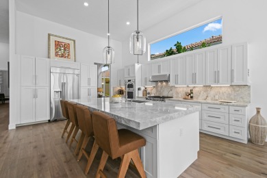 This expanded Montecito model has been completely reimagined on Frenchmans Reserve in Florida - for sale on GolfHomes.com, golf home, golf lot