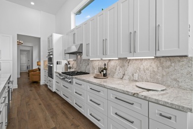 This expanded Montecito model has been completely reimagined on Frenchmans Reserve in Florida - for sale on GolfHomes.com, golf home, golf lot
