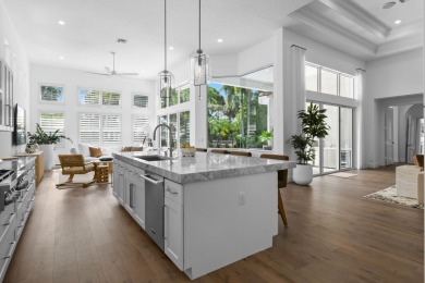 This expanded Montecito model has been completely reimagined on Frenchmans Reserve in Florida - for sale on GolfHomes.com, golf home, golf lot