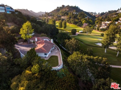 Sited on a promontory site within the West Gate of prestigious on Bel-Air Country Club in California - for sale on GolfHomes.com, golf home, golf lot