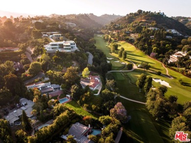 Sited on a promontory site within the West Gate of prestigious on Bel-Air Country Club in California - for sale on GolfHomes.com, golf home, golf lot