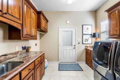 Welcome home to this charming custom residence tucked away on a on Pecan Plantation Country Club in Texas - for sale on GolfHomes.com, golf home, golf lot