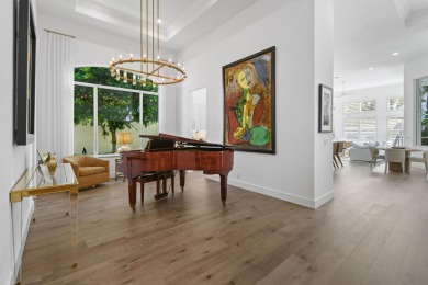 This expanded Montecito model has been completely reimagined on Frenchmans Reserve in Florida - for sale on GolfHomes.com, golf home, golf lot