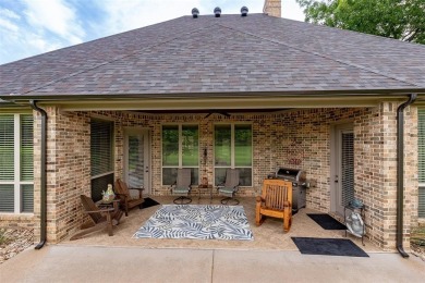 Welcome home to this charming custom residence tucked away on a on Pecan Plantation Country Club in Texas - for sale on GolfHomes.com, golf home, golf lot