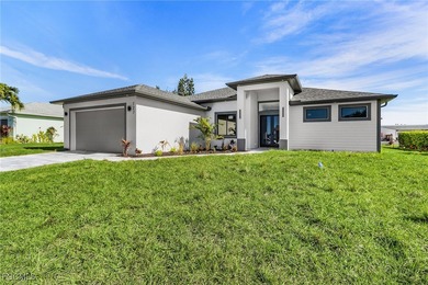 Welcome to 127 NW 14th Ave!!! Come see this beautiful new on Burnt Store Golf Club in Florida - for sale on GolfHomes.com, golf home, golf lot