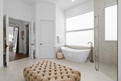 This expanded Montecito model has been completely reimagined on Frenchmans Reserve in Florida - for sale on GolfHomes.com, golf home, golf lot