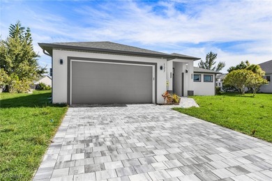 Welcome to 127 NW 14th Ave!!! Come see this beautiful new on Burnt Store Golf Club in Florida - for sale on GolfHomes.com, golf home, golf lot
