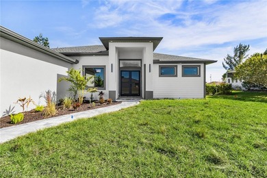 Welcome to 127 NW 14th Ave!!! Come see this beautiful new on Burnt Store Golf Club in Florida - for sale on GolfHomes.com, golf home, golf lot