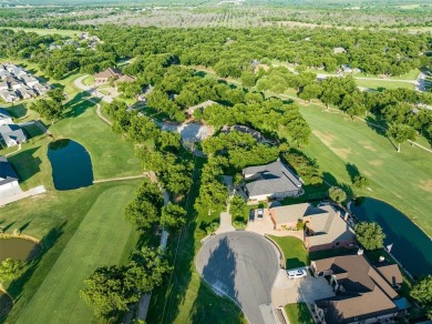 Welcome home to this charming custom residence tucked away on a on Pecan Plantation Country Club in Texas - for sale on GolfHomes.com, golf home, golf lot