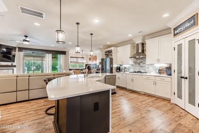 Luxury Townhome | Stunning Golf & Water Views | Elevator | Fully on Sea Trail Golf Resort in North Carolina - for sale on GolfHomes.com, golf home, golf lot