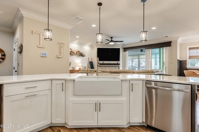 Luxury Townhome | Stunning Golf & Water Views | Elevator | Fully on Sea Trail Golf Resort in North Carolina - for sale on GolfHomes.com, golf home, golf lot
