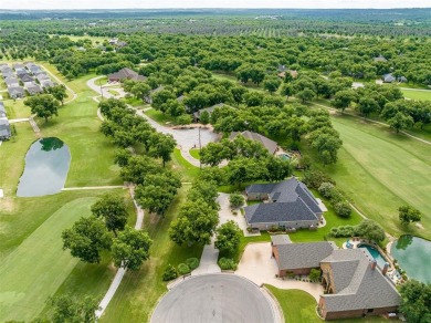 Welcome home to this charming custom residence tucked away on a on Pecan Plantation Country Club in Texas - for sale on GolfHomes.com, golf home, golf lot