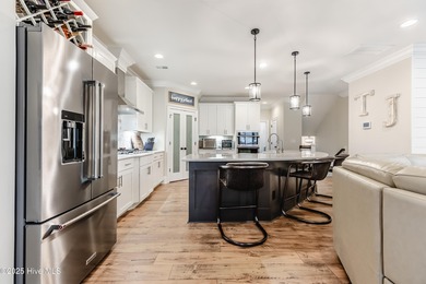 Luxury Townhome | Stunning Golf & Water Views | Elevator | Fully on Sea Trail Golf Resort in North Carolina - for sale on GolfHomes.com, golf home, golf lot