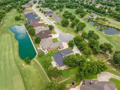 Welcome home to this charming custom residence tucked away on a on Pecan Plantation Country Club in Texas - for sale on GolfHomes.com, golf home, golf lot