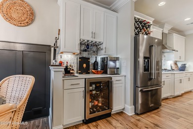 Luxury Townhome | Stunning Golf & Water Views | Elevator | Fully on Sea Trail Golf Resort in North Carolina - for sale on GolfHomes.com, golf home, golf lot