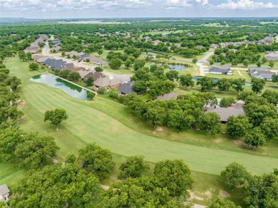 Welcome home to this charming custom residence tucked away on a on Pecan Plantation Country Club in Texas - for sale on GolfHomes.com, golf home, golf lot