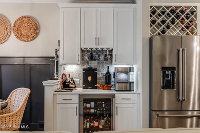 Luxury Townhome | Stunning Golf & Water Views | Elevator | Fully on Sea Trail Golf Resort in North Carolina - for sale on GolfHomes.com, golf home, golf lot