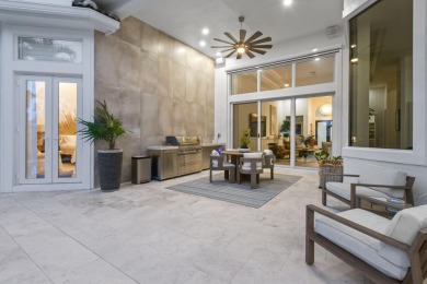 This expanded Montecito model has been completely reimagined on Frenchmans Reserve in Florida - for sale on GolfHomes.com, golf home, golf lot