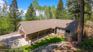 $10,000 flooring allowance offered!! Nestled amidst the towering on Aspen Hills Golf Course in Wyoming - for sale on GolfHomes.com, golf home, golf lot