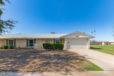 Nestled on a charming tree-lined street, this home offers on Sun City Lakes West and East in Arizona - for sale on GolfHomes.com, golf home, golf lot