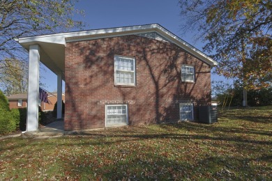 This beautiful home has been completely redone. New flooring on Southwind Golf Course in Kentucky - for sale on GolfHomes.com, golf home, golf lot