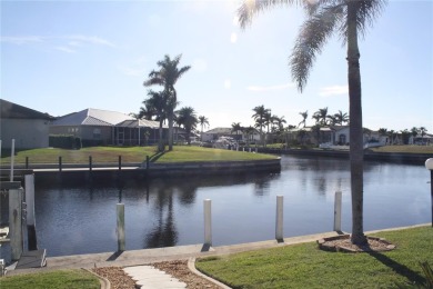 WATERFRONT pool home in Punta Gorda Isles, with intersecting on Saint Andrews South Golf Club in Florida - for sale on GolfHomes.com, golf home, golf lot