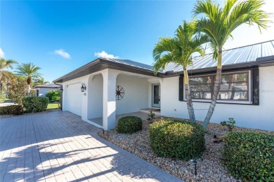 WATERFRONT pool home in Punta Gorda Isles, with intersecting on Saint Andrews South Golf Club in Florida - for sale on GolfHomes.com, golf home, golf lot