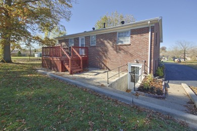 This beautiful home has been completely redone. New flooring on Southwind Golf Course in Kentucky - for sale on GolfHomes.com, golf home, golf lot