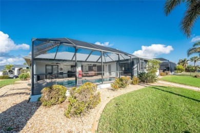 WATERFRONT pool home in Punta Gorda Isles, with intersecting on Saint Andrews South Golf Club in Florida - for sale on GolfHomes.com, golf home, golf lot