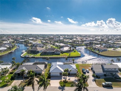 WATERFRONT pool home in Punta Gorda Isles, with intersecting on Saint Andrews South Golf Club in Florida - for sale on GolfHomes.com, golf home, golf lot