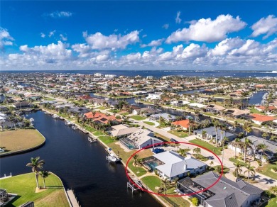 WATERFRONT pool home in Punta Gorda Isles, with intersecting on Saint Andrews South Golf Club in Florida - for sale on GolfHomes.com, golf home, golf lot