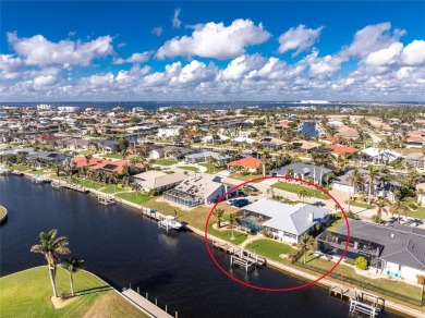 WATERFRONT pool home in Punta Gorda Isles, with intersecting on Saint Andrews South Golf Club in Florida - for sale on GolfHomes.com, golf home, golf lot