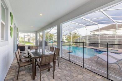 This stunning corner lot home is truly a gem - perfect for a on The Oasis Club at Champions Gate in Florida - for sale on GolfHomes.com, golf home, golf lot